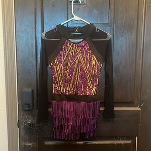 Purple and gold dance costume with fringe skirt